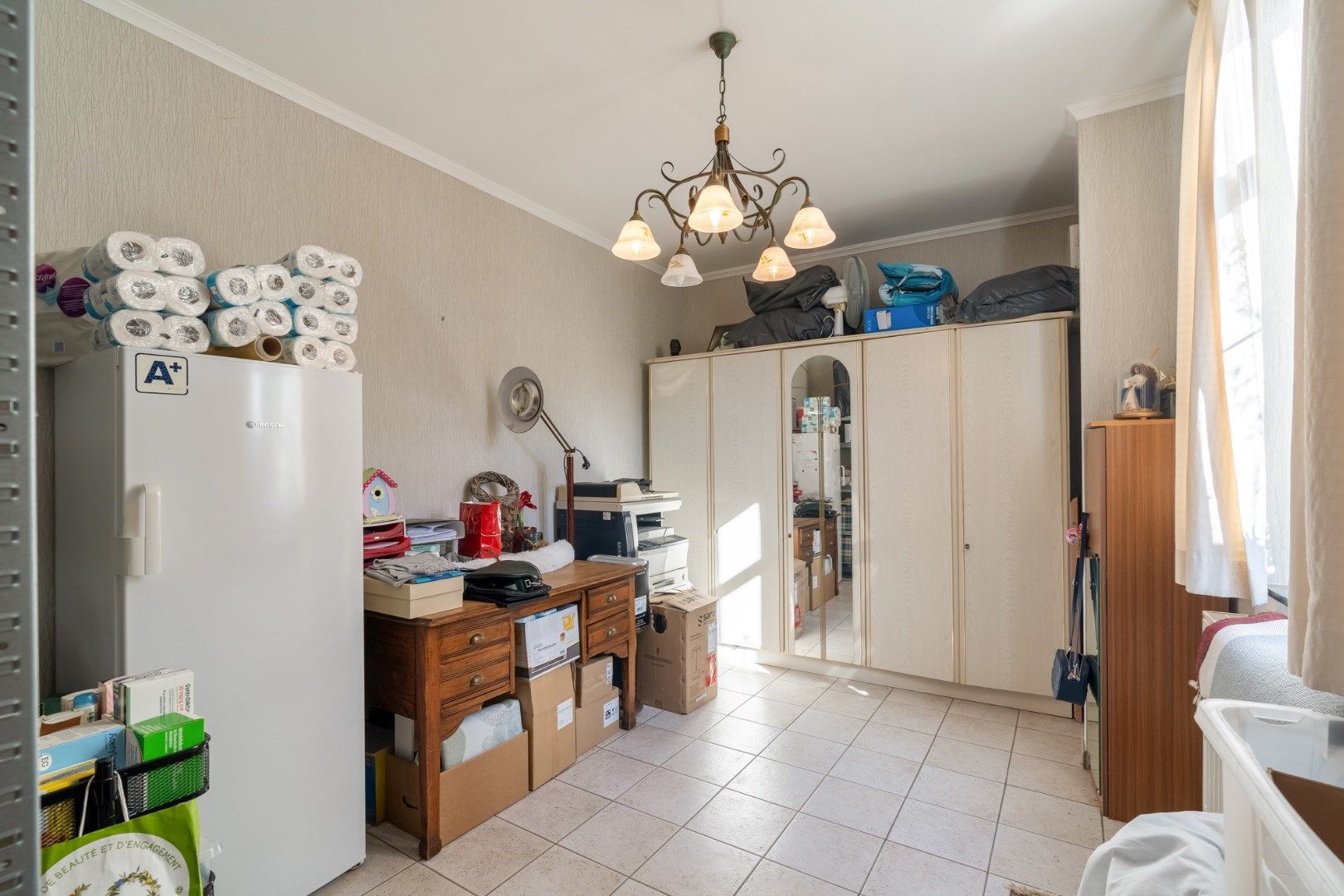 Statige herenwoning met tuin, herbestemd tot meergezinswoning met twee wooneenheden en garages in het centrum van Hoeselt foto 9