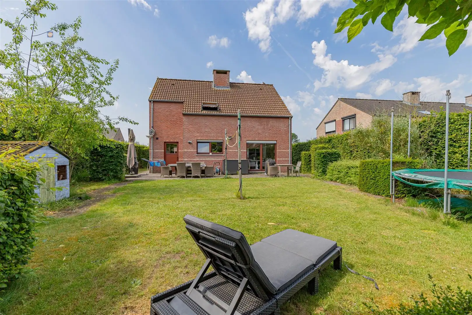 Open bebouwing met 3 slpk en grote tuin in rustige wijk foto 16