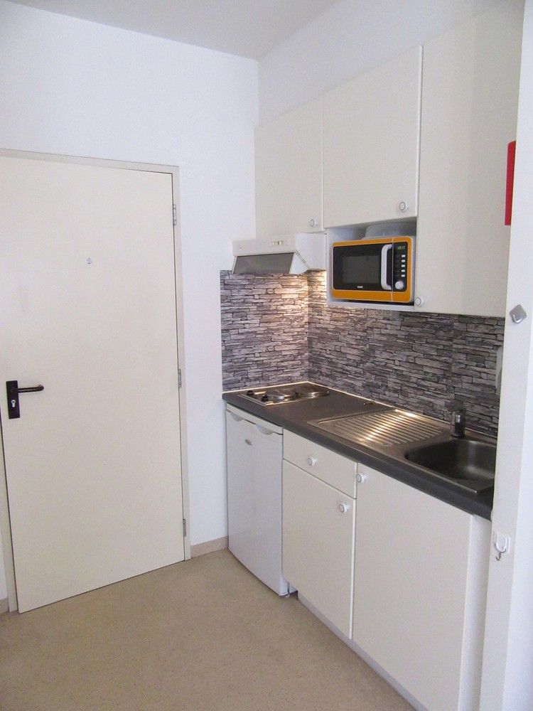 Studentenstudio met kitchenette en badkamer te koop op zeer gegeerde locatie tussen UZ Leuven en centrum Leuven foto 4