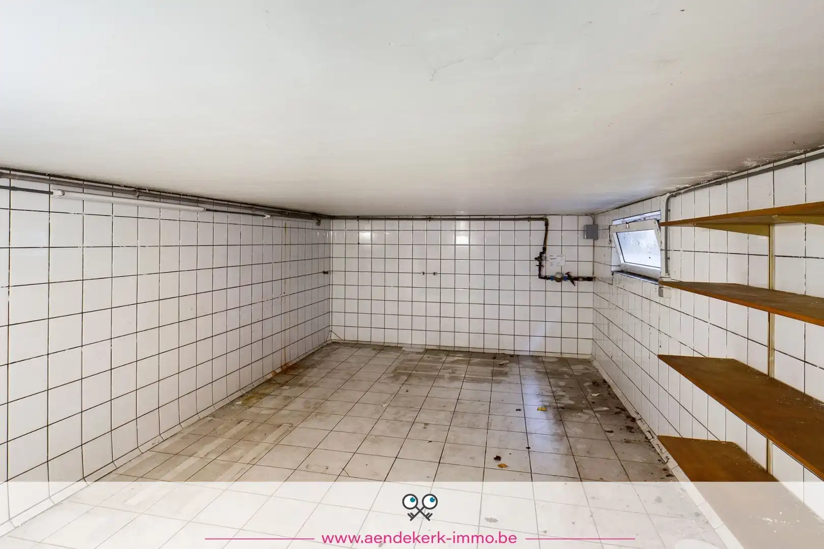 Woning met handelsruimte in het centrum van Kinrooi foto 26