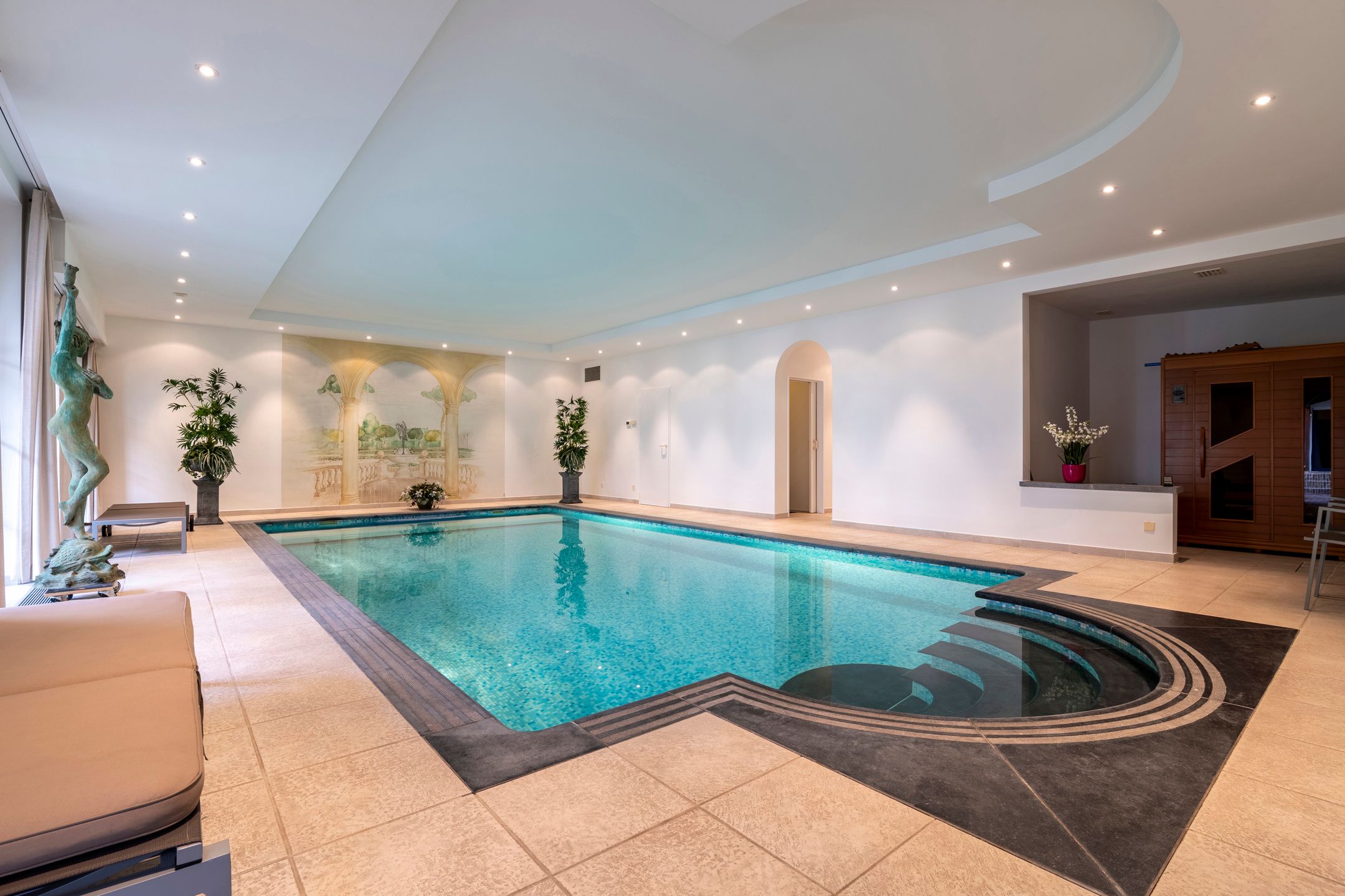 Stijlvol gelijkvloers appartement met binnenterras, tuin en binnenzwembad met wellness. foto 31