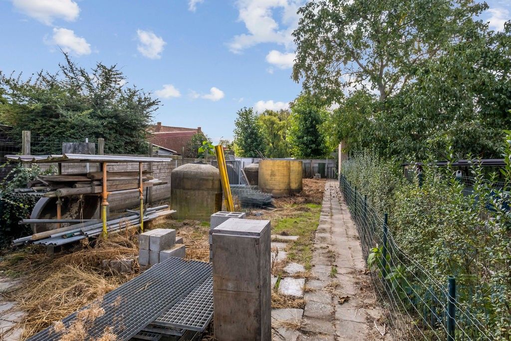 Ruime woning met tuin en uitweg in het hart van Ingelmunster foto 9