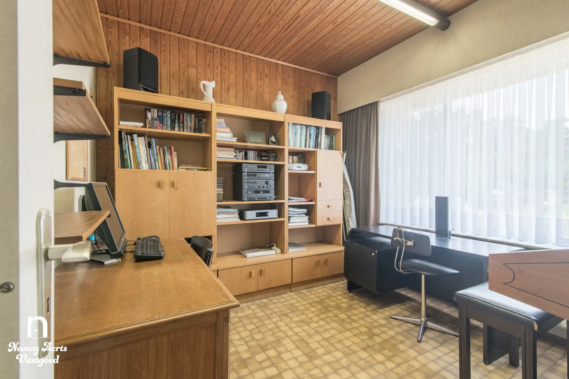 Uitstekend onderhouden split‑level woning in groene omgeving foto 16