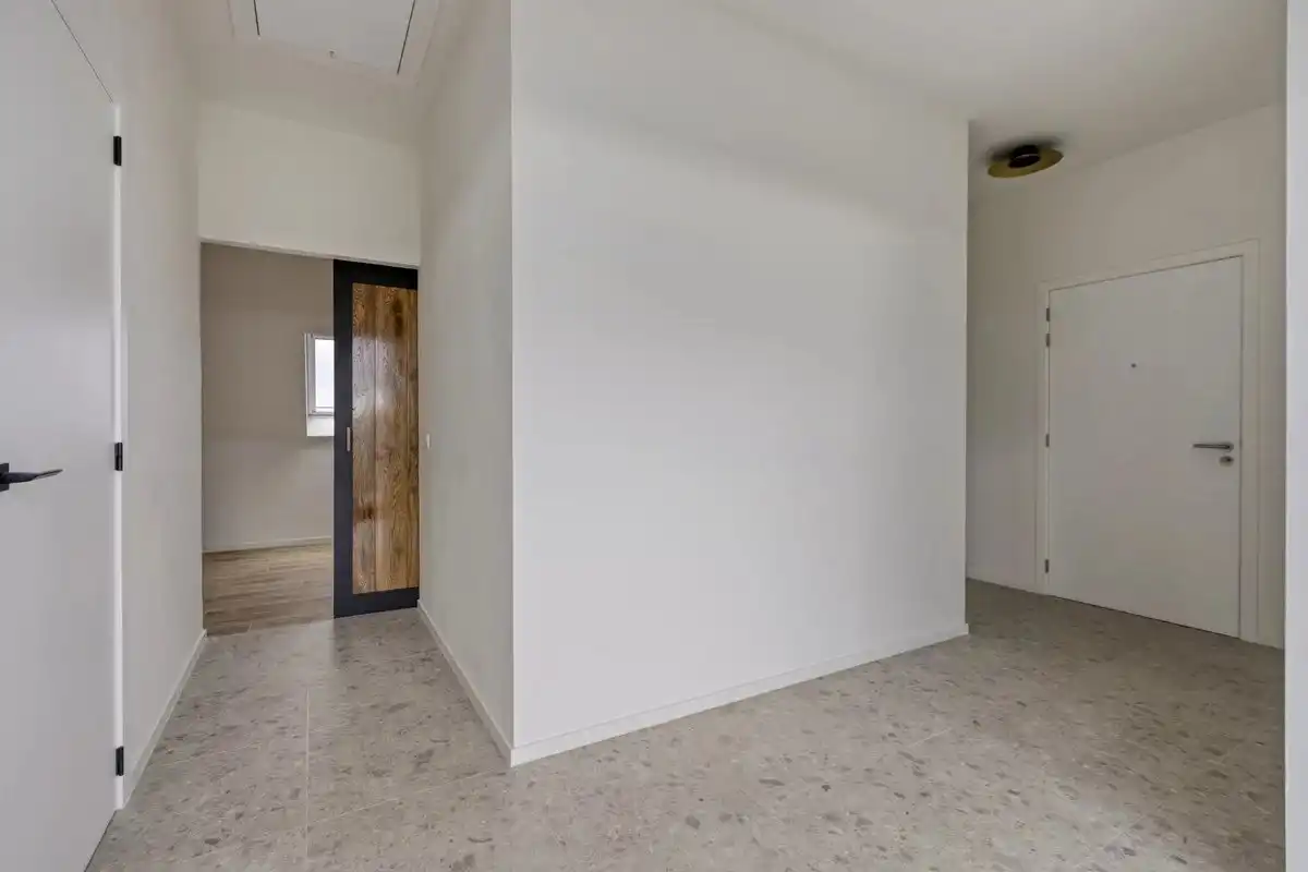 EXCLUSIEF EN KWALITATIEF NIEUWBOUWAPPARTEMENT VAN 163 M² MET 3 SLPK'S, 2 BADK'S EN RIANTE TERRASSEN IN MUNSTERBILZEN foto 17
