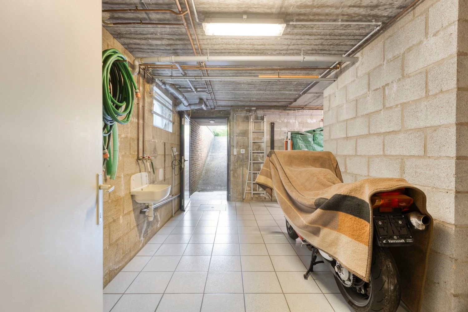 Instapklare woning in een bosrijke, rustige buurt te Maasmechelen! foto 34