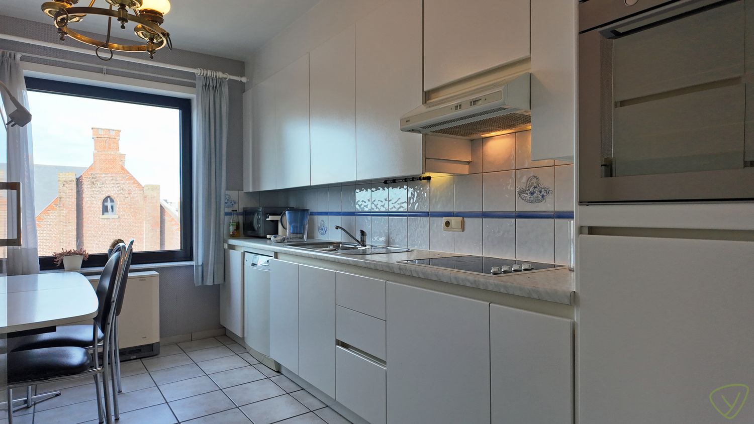 Ruim en lichtrijk appartement met lift en terras in residentie “Mozart” te Eeklo! foto 12