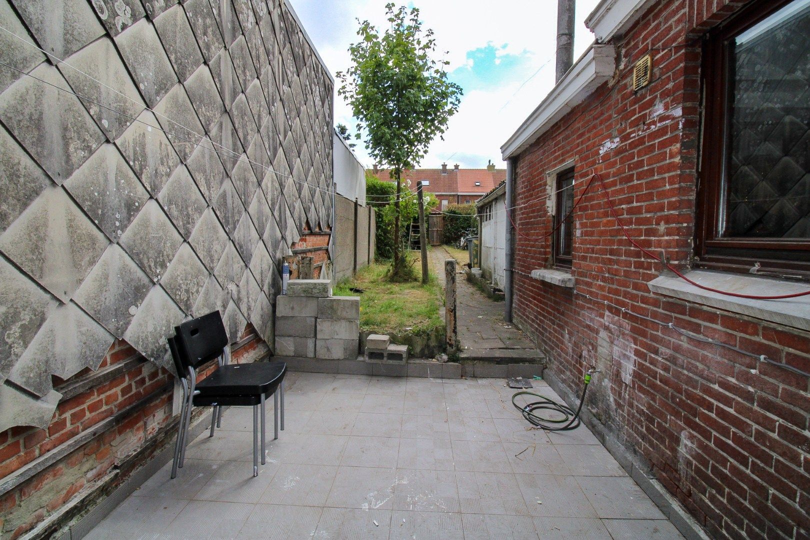 Te koop: Charmante rijwoning met diepe tuin in hartje Sint-Niklaas! foto 13