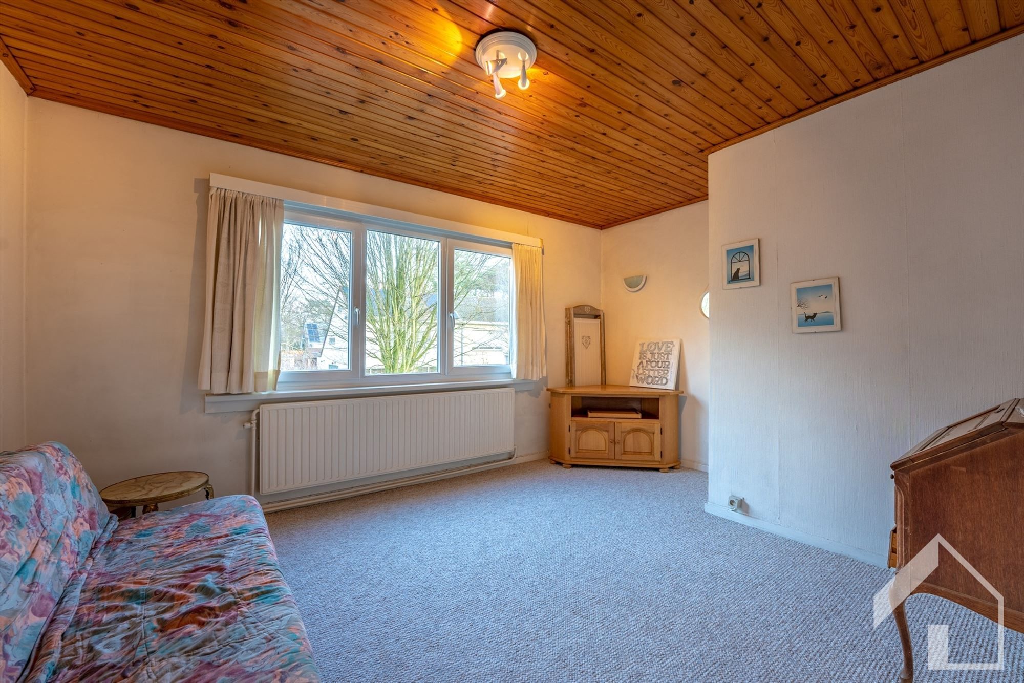 Gezinswoning met 4 ruime slaapkamers, garage en leuke tuin foto 13