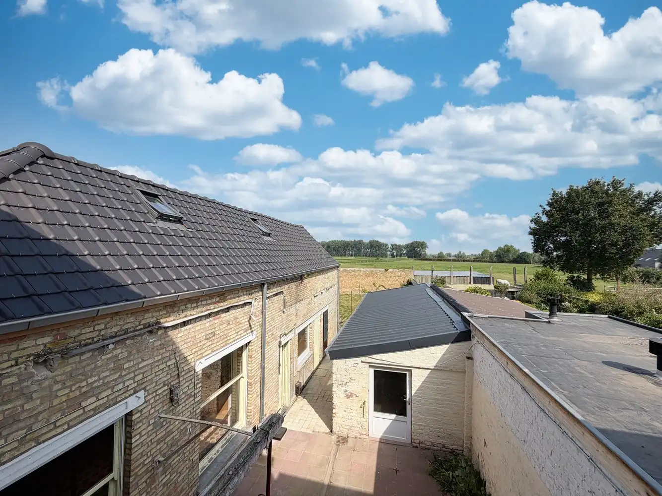 Ruime woning met polyvalente ruimte, zonnige tuin en tal van mogelijkheden foto 13