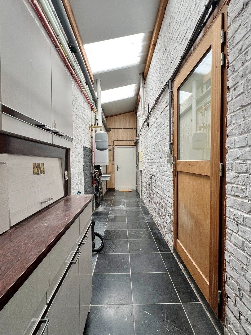 Instapklare woning met prachtige tuin op een perceel van 1.680m² op 500meter van de markt.  foto 18