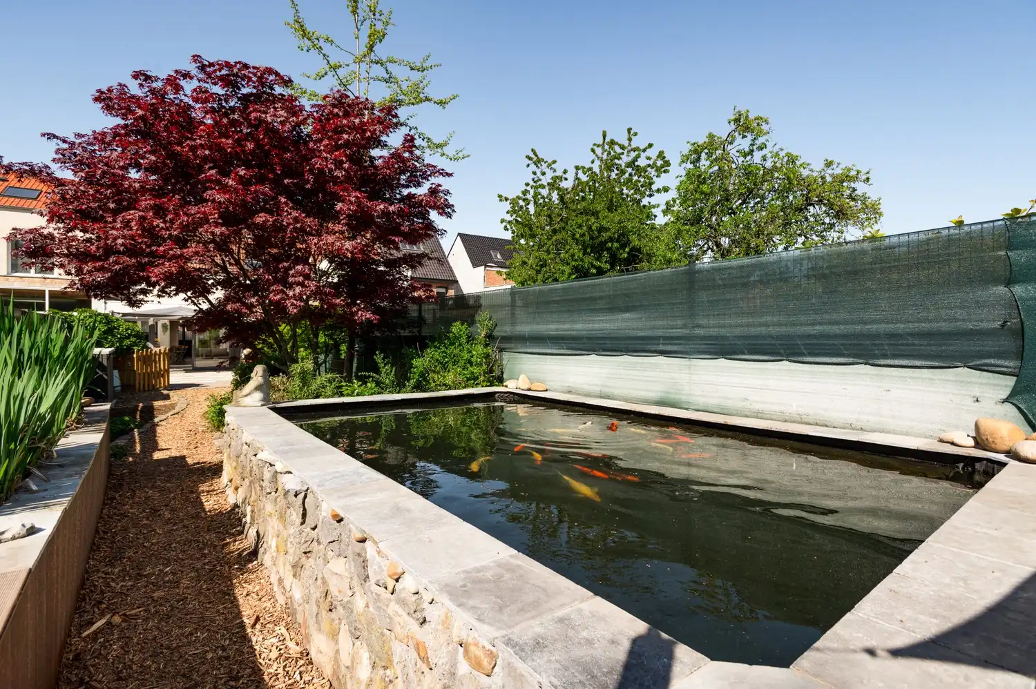 Gezellige woning met 3 slaapkamers en tuin met vijver in Wijnegem foto 16