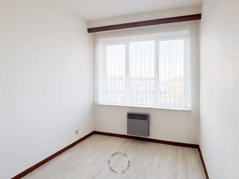 Ruim en lichtrijk appartement met 3 slaapkamers in hartje Beveren foto 9