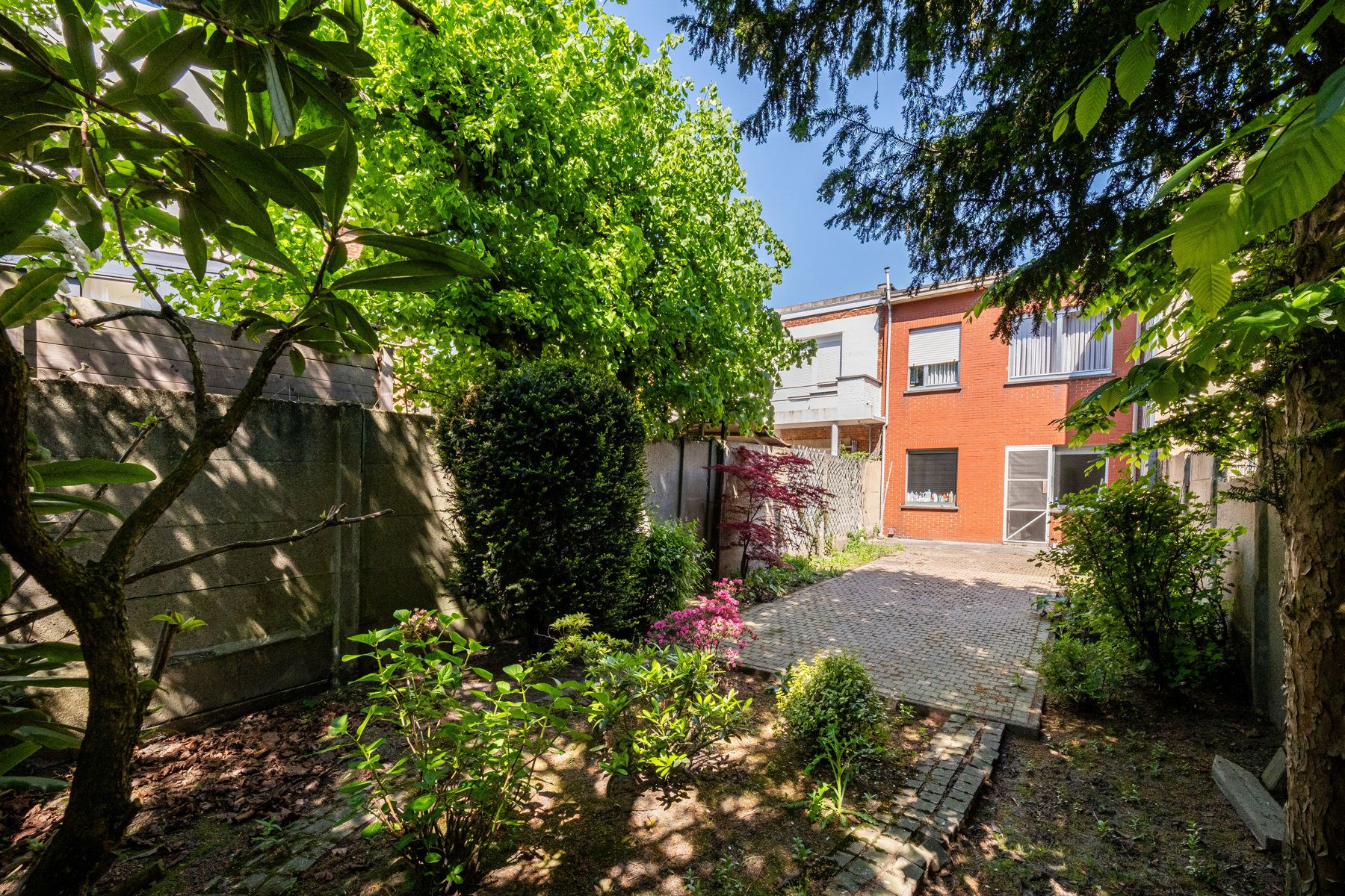 Woning met potentieel én grote tuin vlak bij het Rivierenhof foto 13