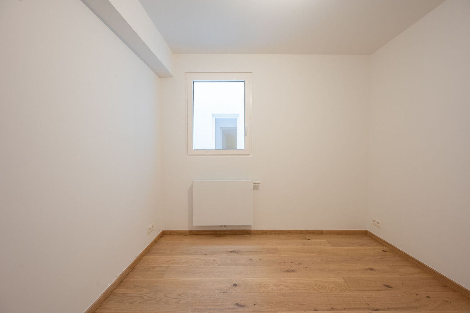 Instapklaar 2-slaapkamerappartement met zijdelings zeezicht te Heist foto 11