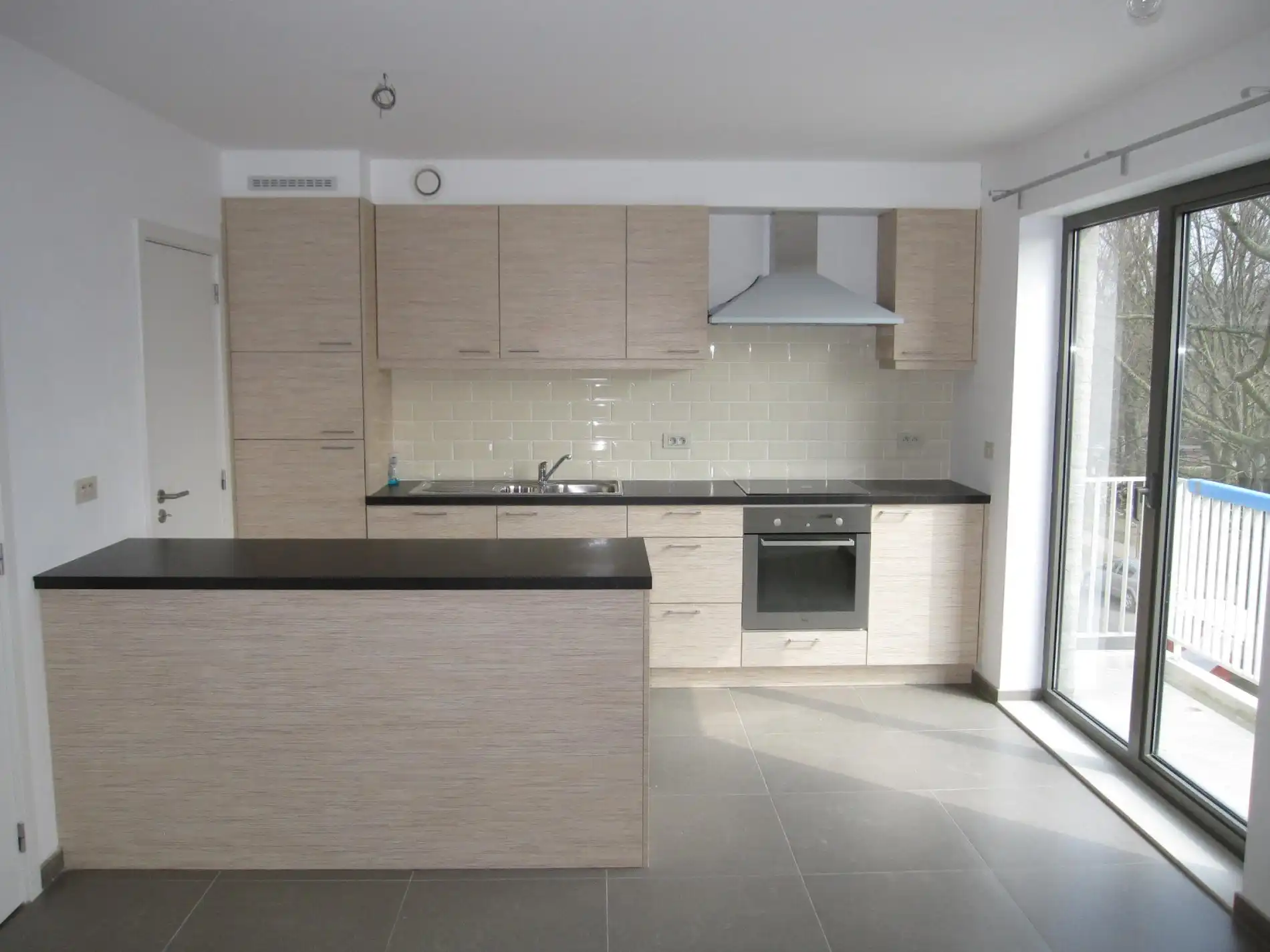 Ruim duplex-appartement met ondergrondse staanplaats en berging foto 2