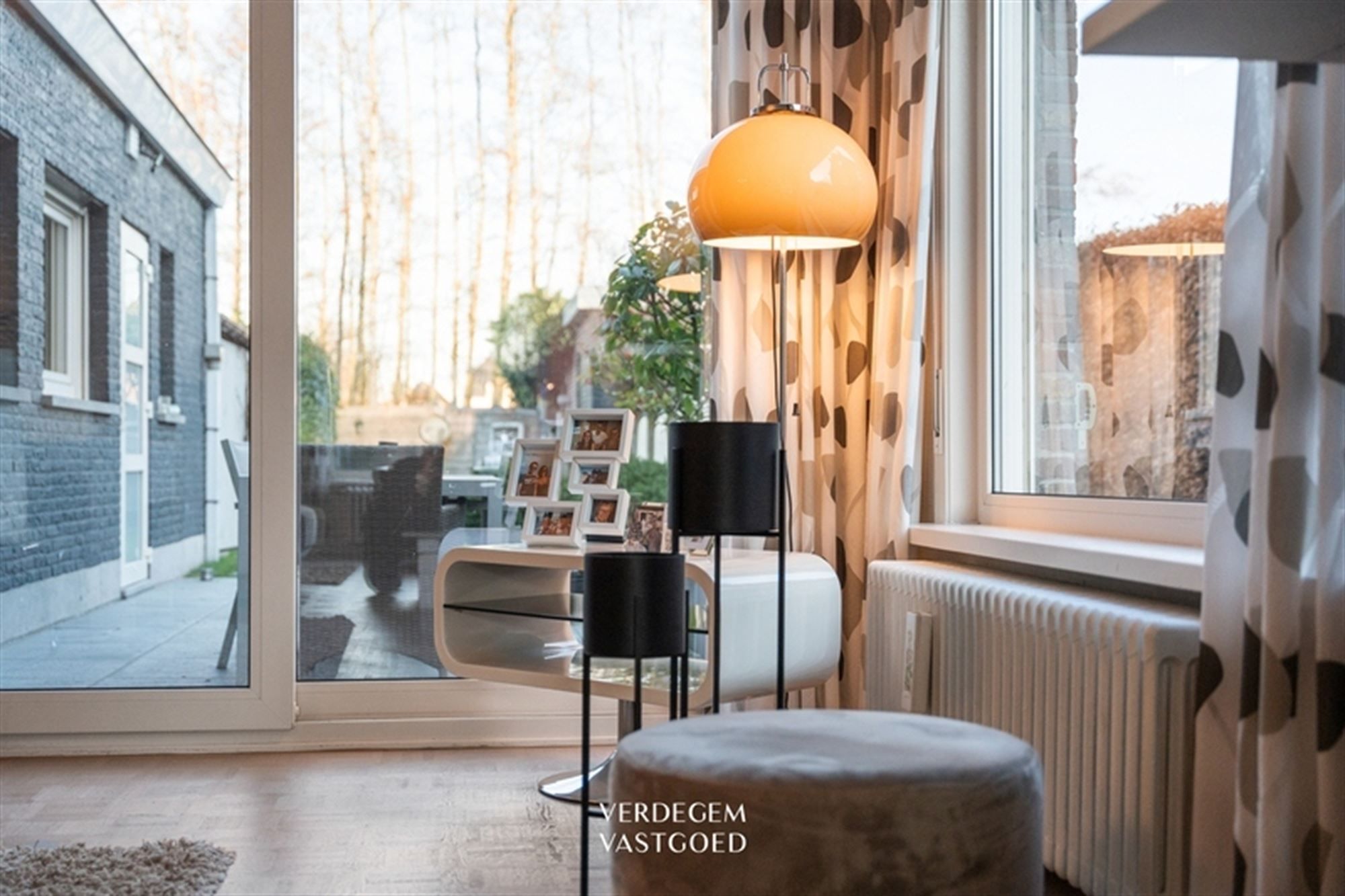 Stijlvolle en instapklare woning met 2+1 slaapkamers, garage en mooie tuin foto 8