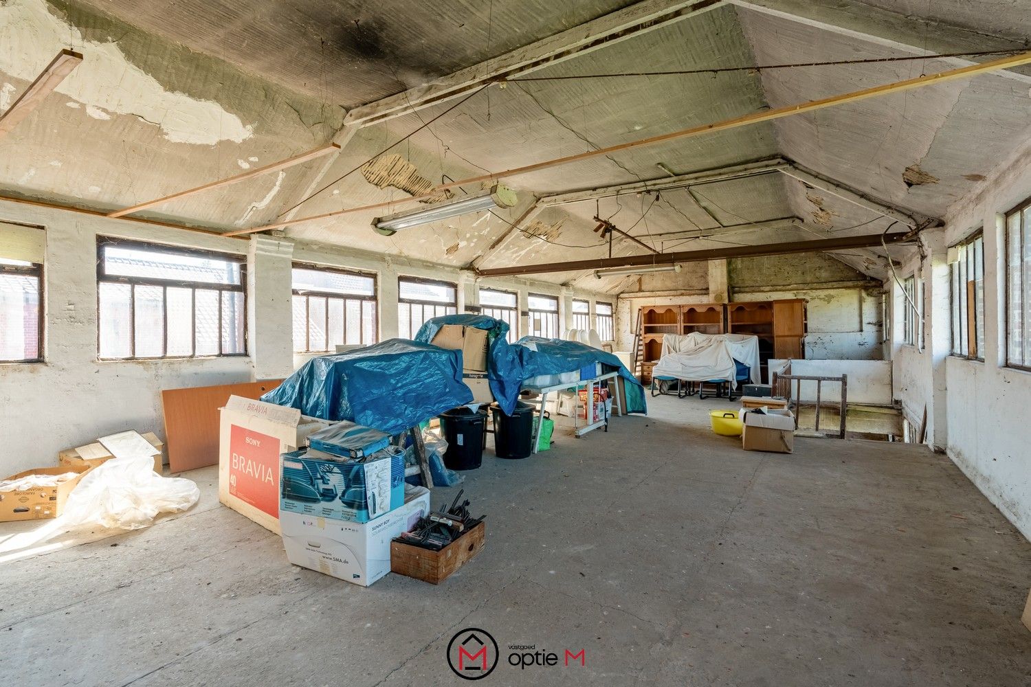 Te renoveren woning met ruim werkhuis foto 27