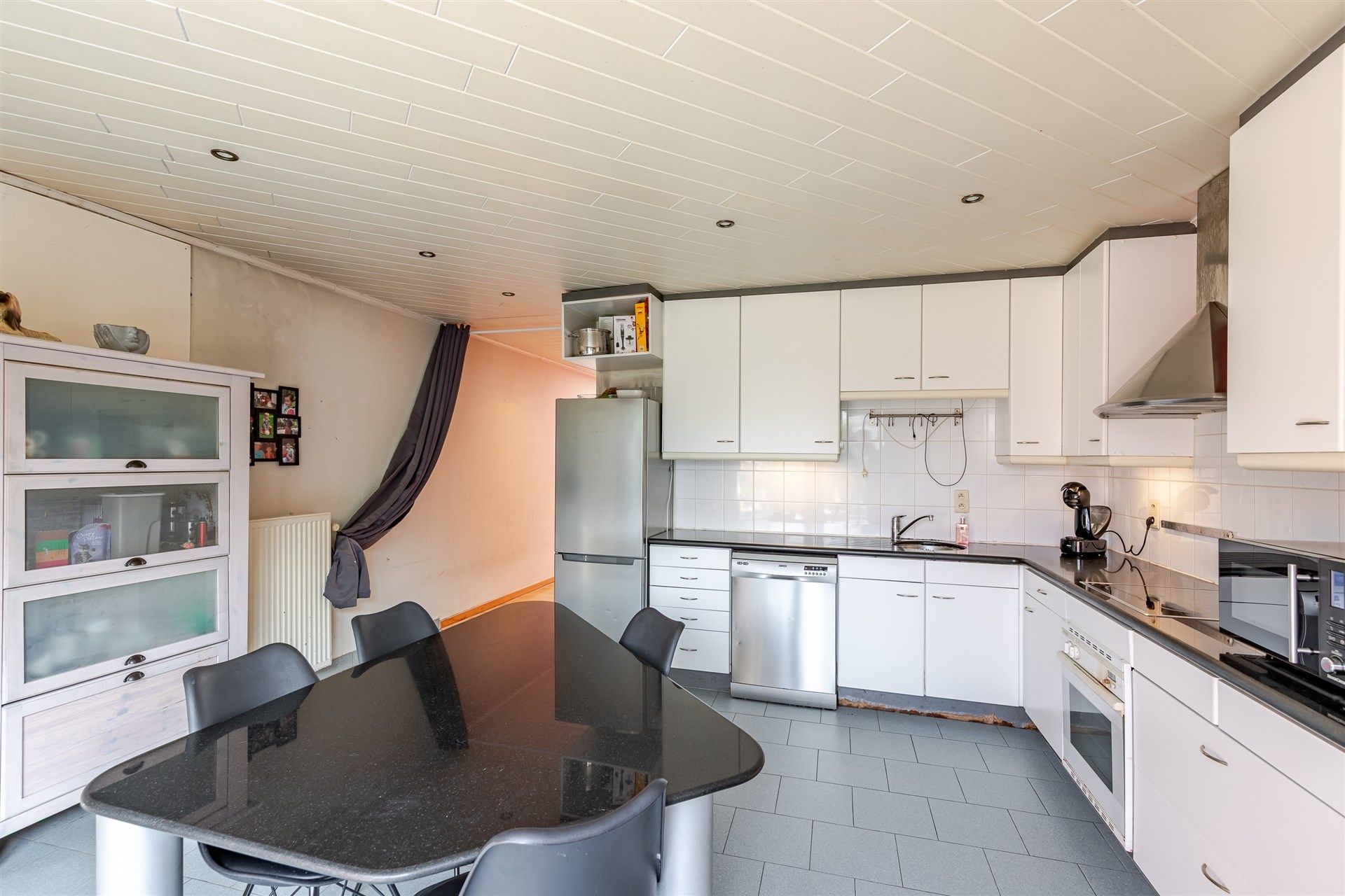 Bijzonder ruime woning met diepe tuin in Wetteren centrum foto 7