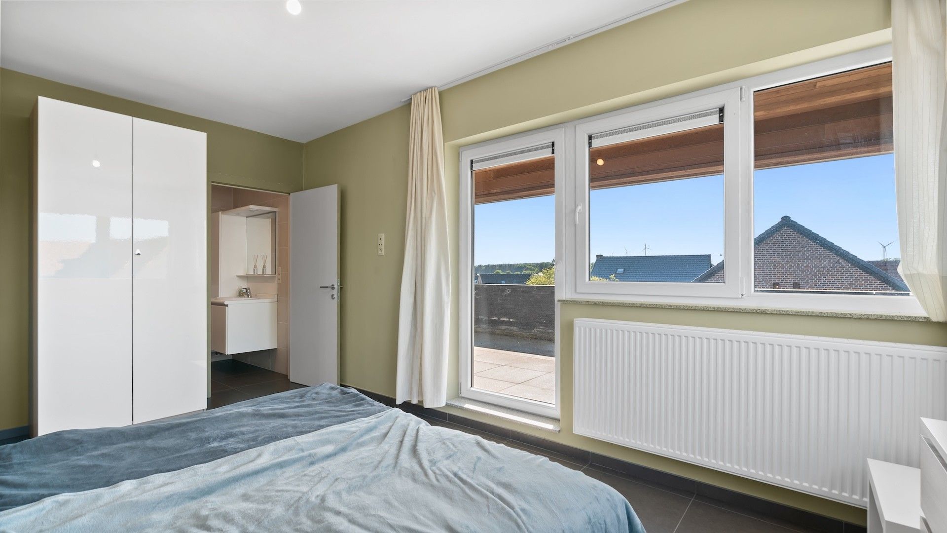 Duplex app. van 220m2 met 3 slpk's en 65m2 aan terrassen foto 15