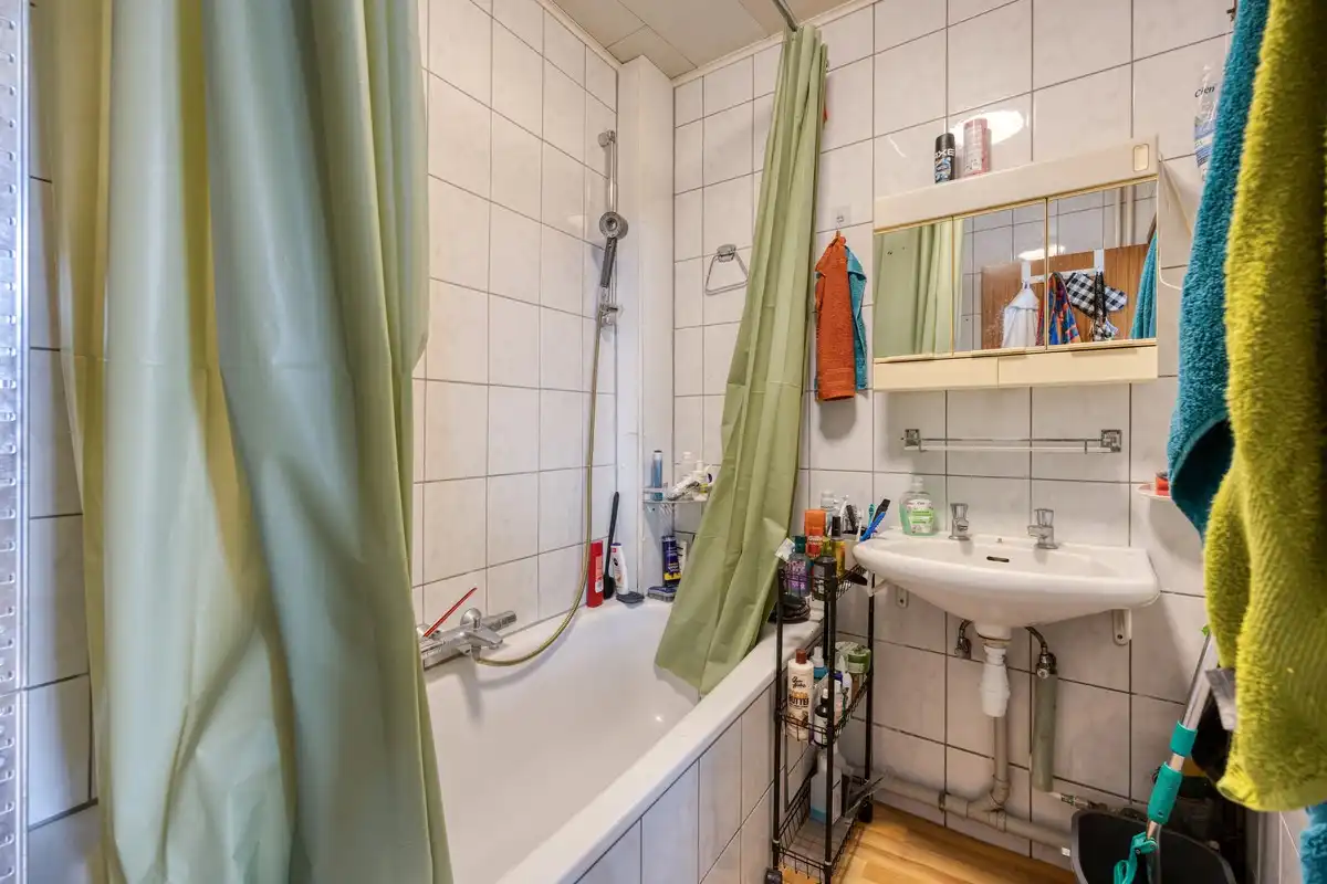 Super gelegen opbrengsteigendom bestaande uit 3 appartementen met tuin in het centrum van Tienen, EPC label C foto 24