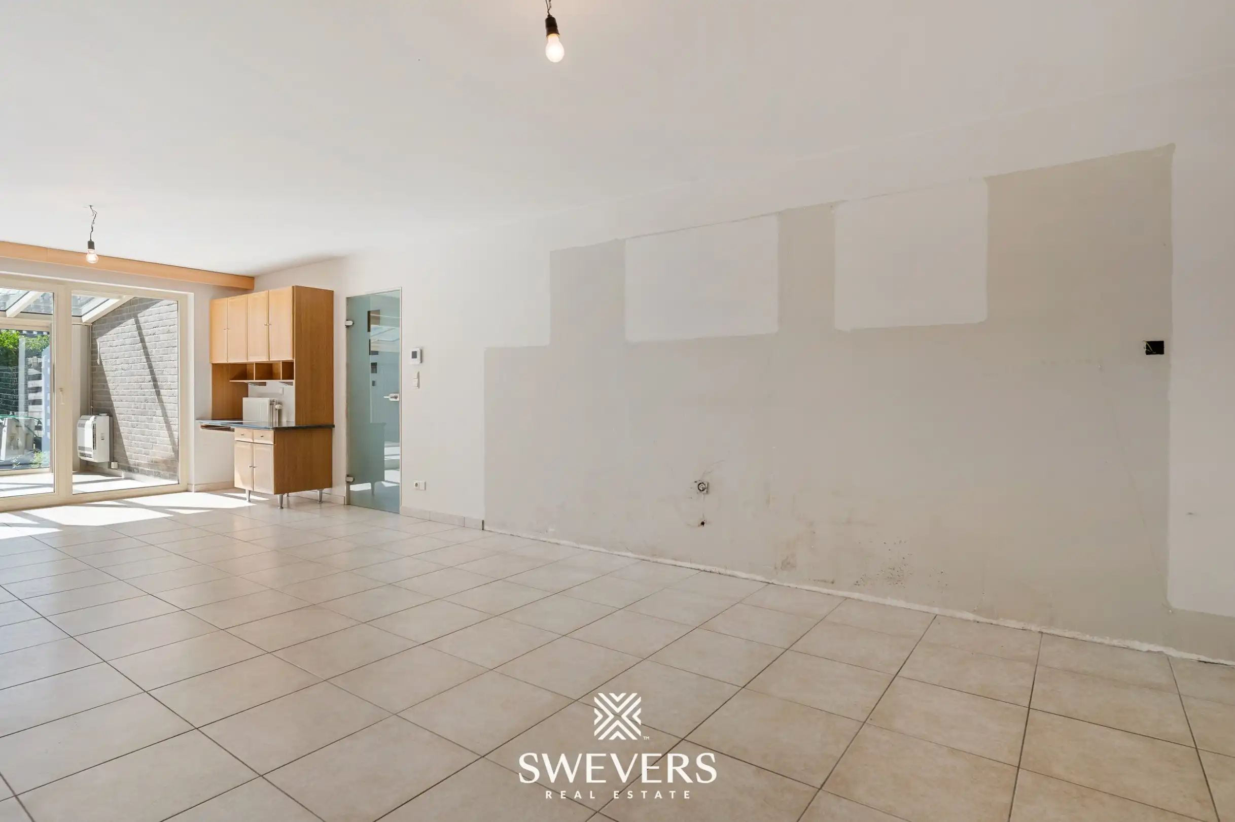 Gelijkvloers appartement met twee slaapkamers, ruime veranda en terras te Bree foto 4