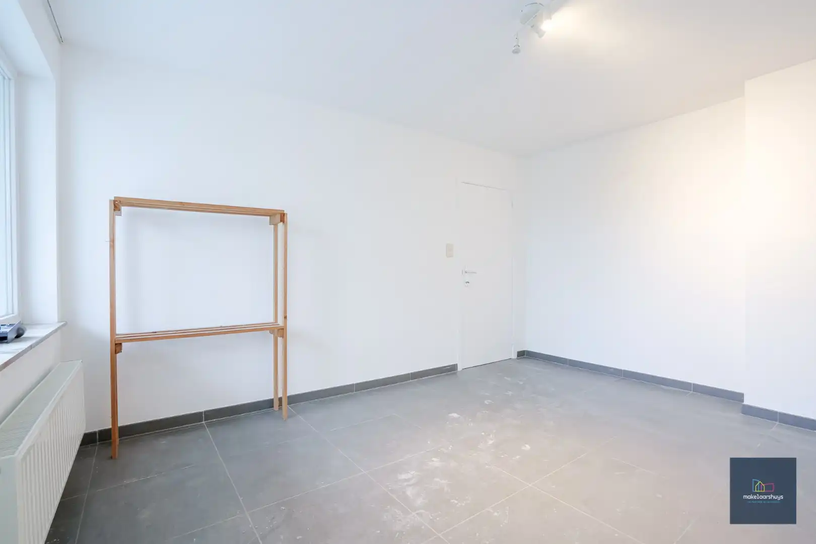 Ruim gelijkvloersappartement met 2 slaapkamers , een  zuidgeorienteerde  tuin en garage foto 7