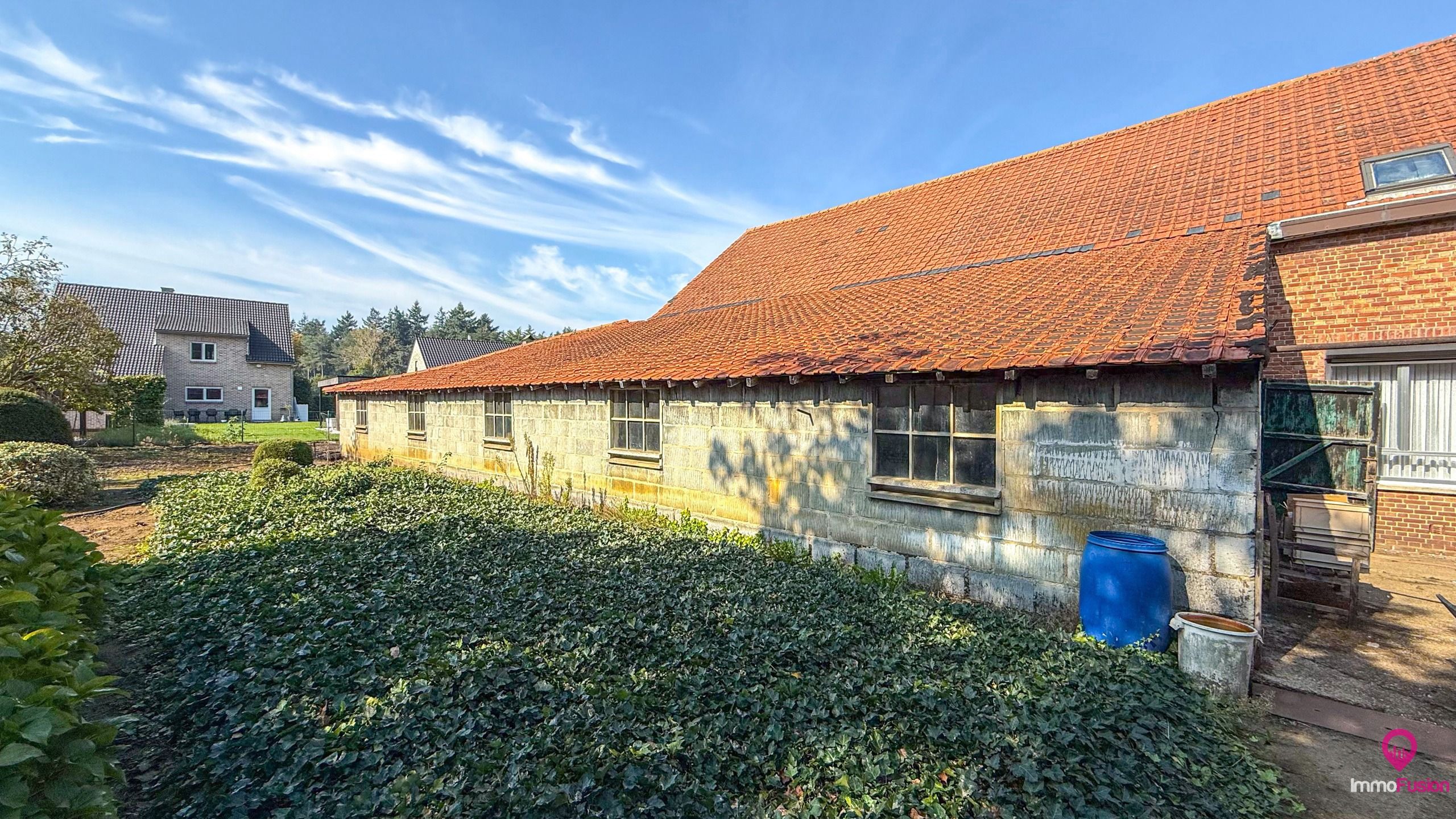 Ruime boerderij op ±33a met stallen en renovatiepotentieel! foto 37