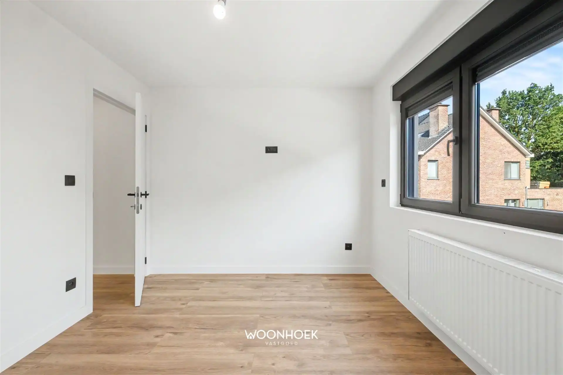 Moderne 3-slpk woning in centrum Waasmunster foto 16