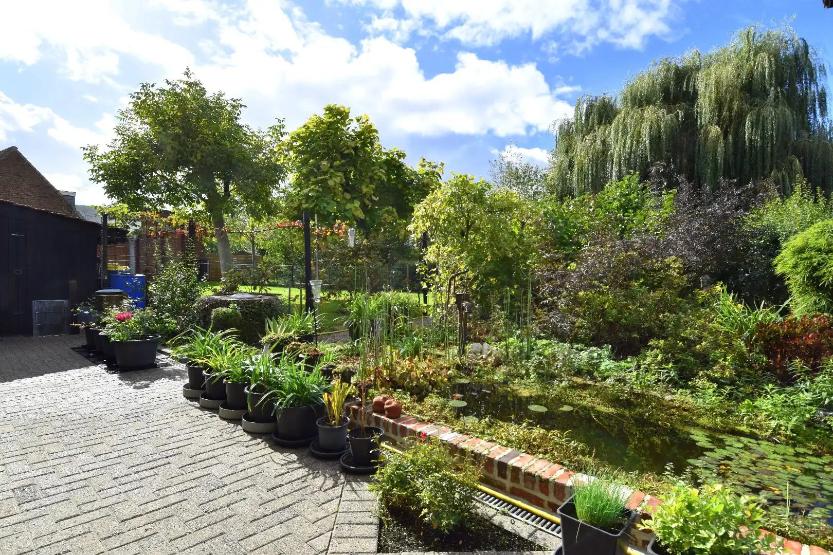 Charmante woning met 3 slaapkamers, 2 garages en een zalige tuin te koop in Gullegem! foto 19