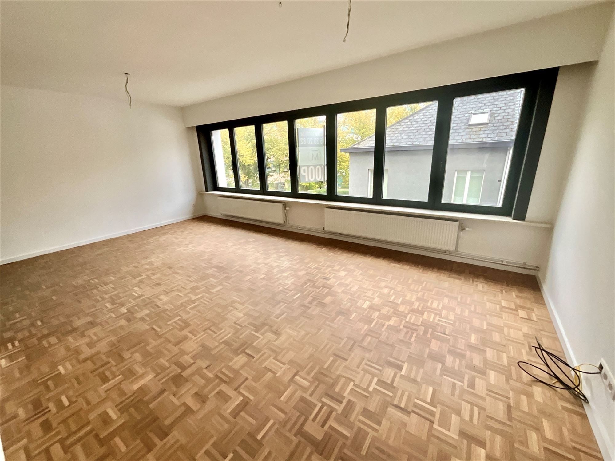 Prachtig gerenoveerd appartement met 2 slaapkamers en wintertuin vlakbij station Mechelen foto 3