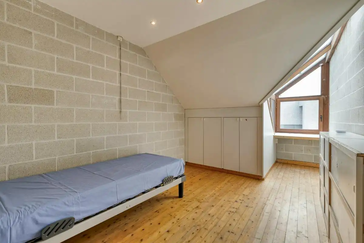 Uniek, lichtrijk huis te koop met speelse tussenniveaus  foto 32