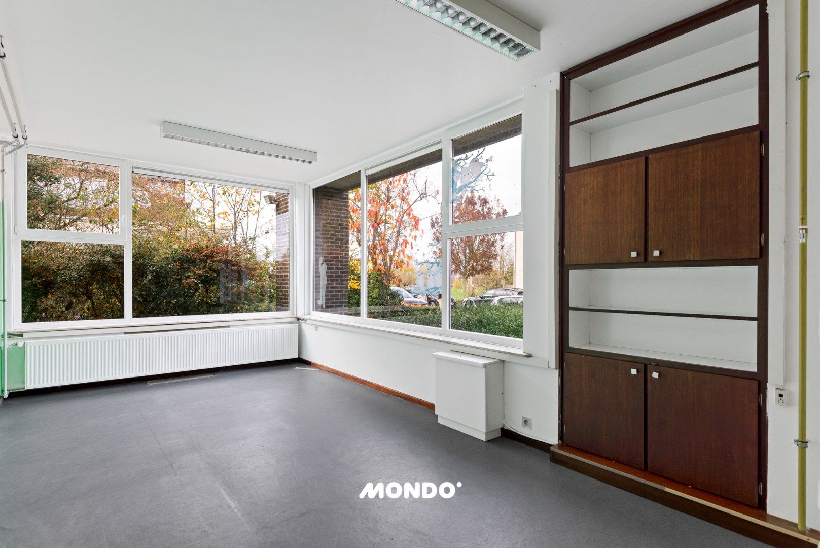 Veelzijdige praktijk- of kantoorruimte met tuin en terras nabij het centrum van Niel! foto 9