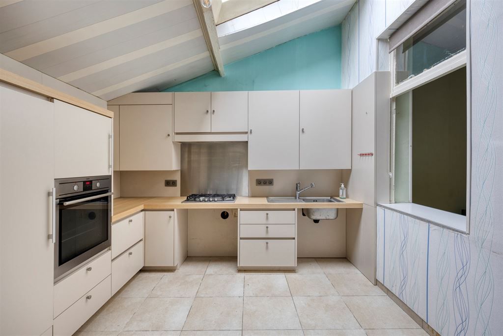 Halfopen woning met potentieel  foto 7