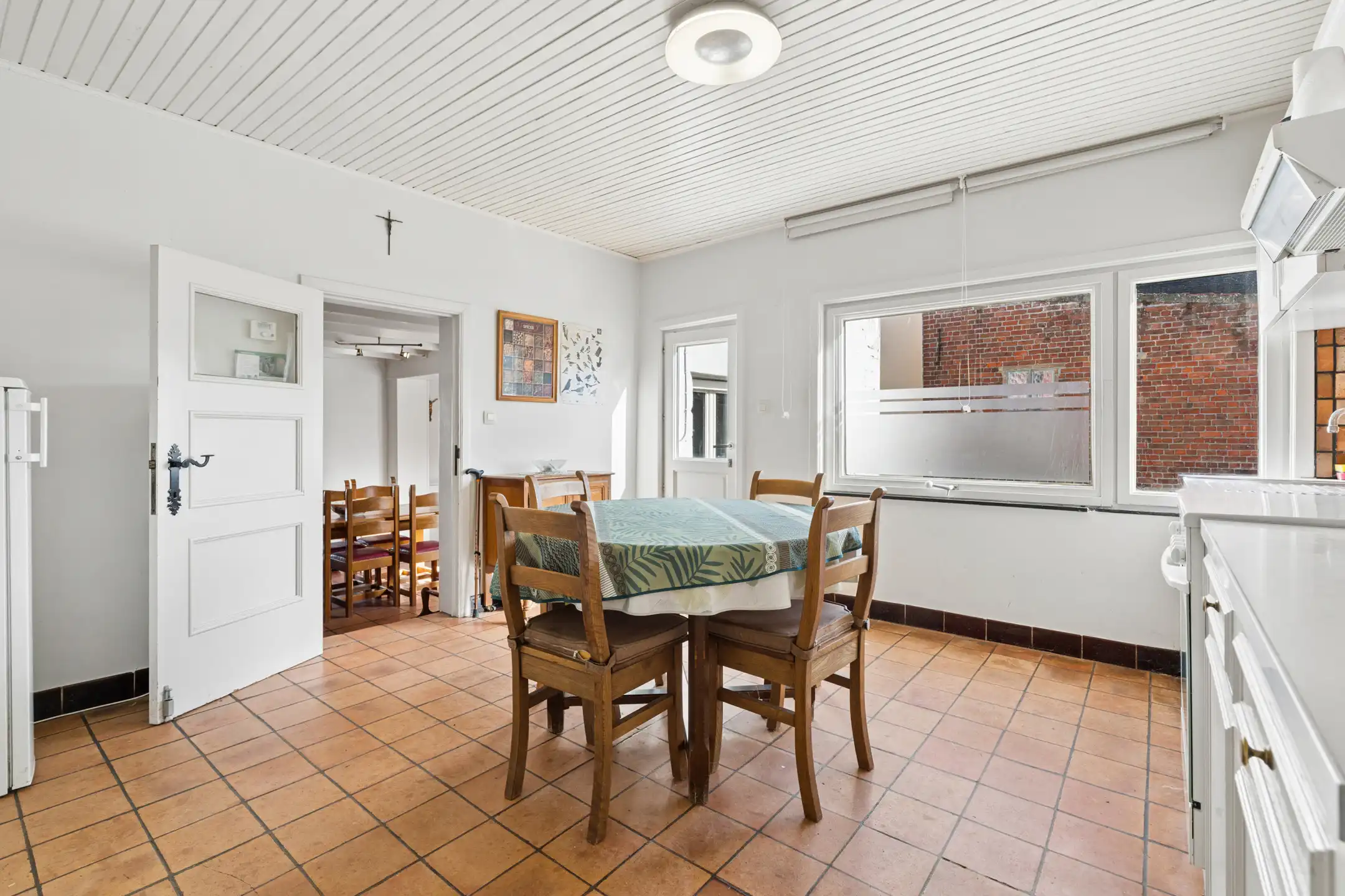 Charmante 3-gevelwoning met garage en tuin foto 5