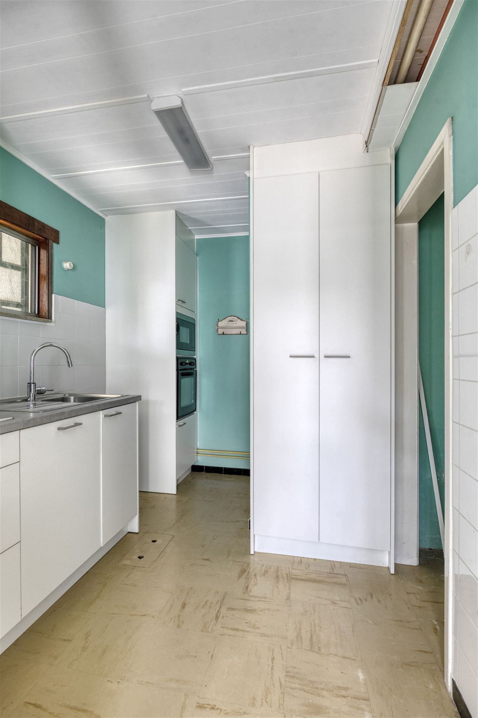 Opbrengstwoning met 2 appartementen en 3 garageboxen foto 11