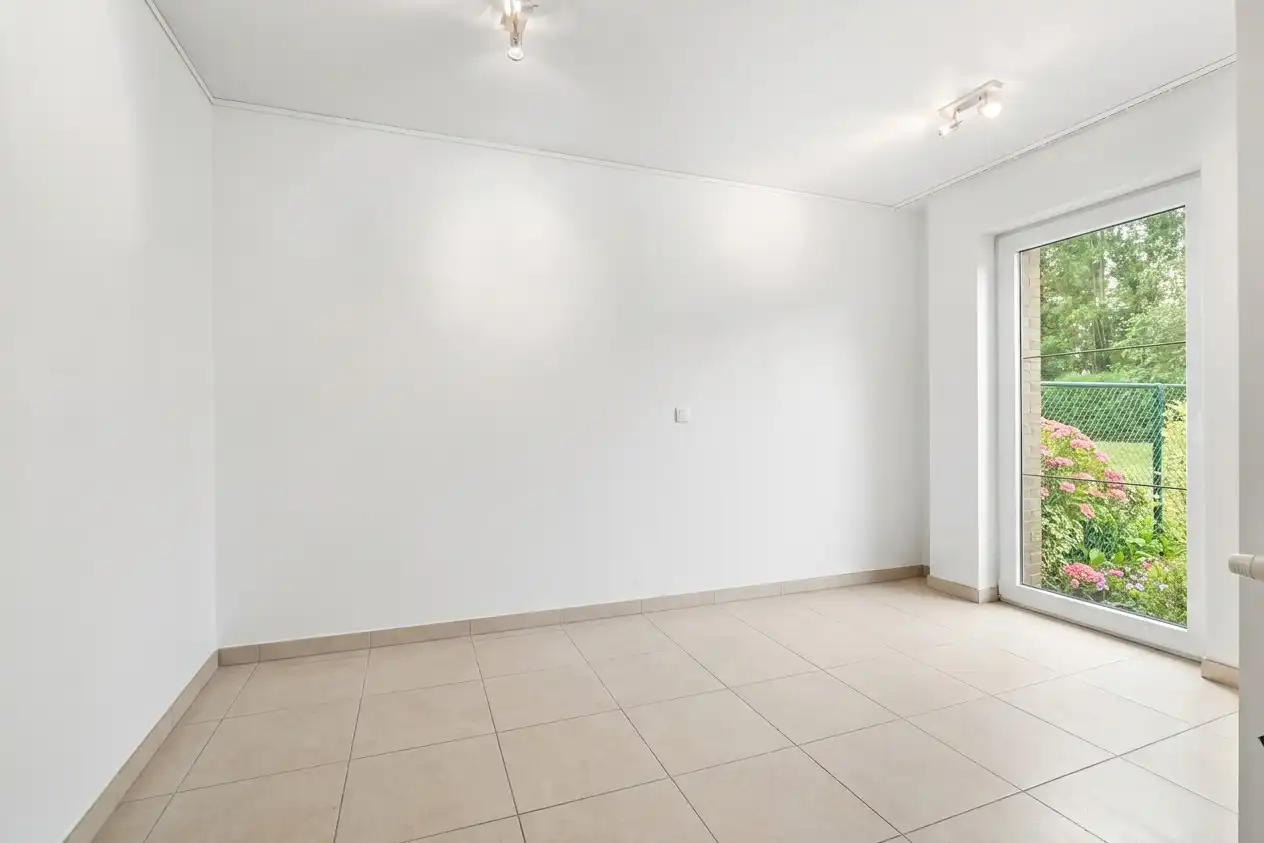 Gelijkvloers energiezuinig appartement met privé tuin en twee slaapkamers foto 14
