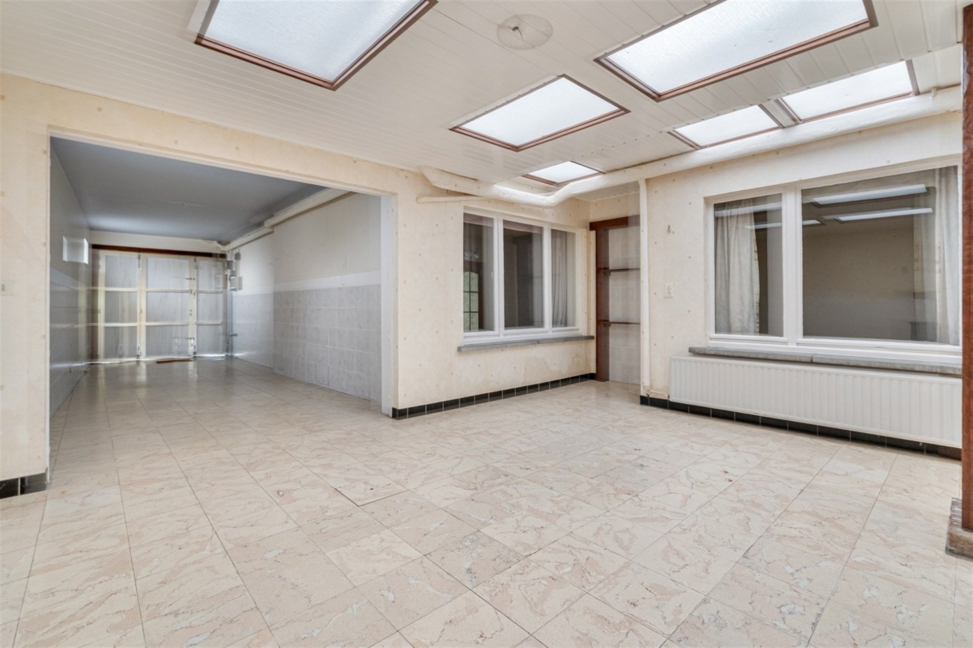 Goed onderhouden gezinswoning met 4 mogelijke slaapkamers op een perceel van 921m² foto 16