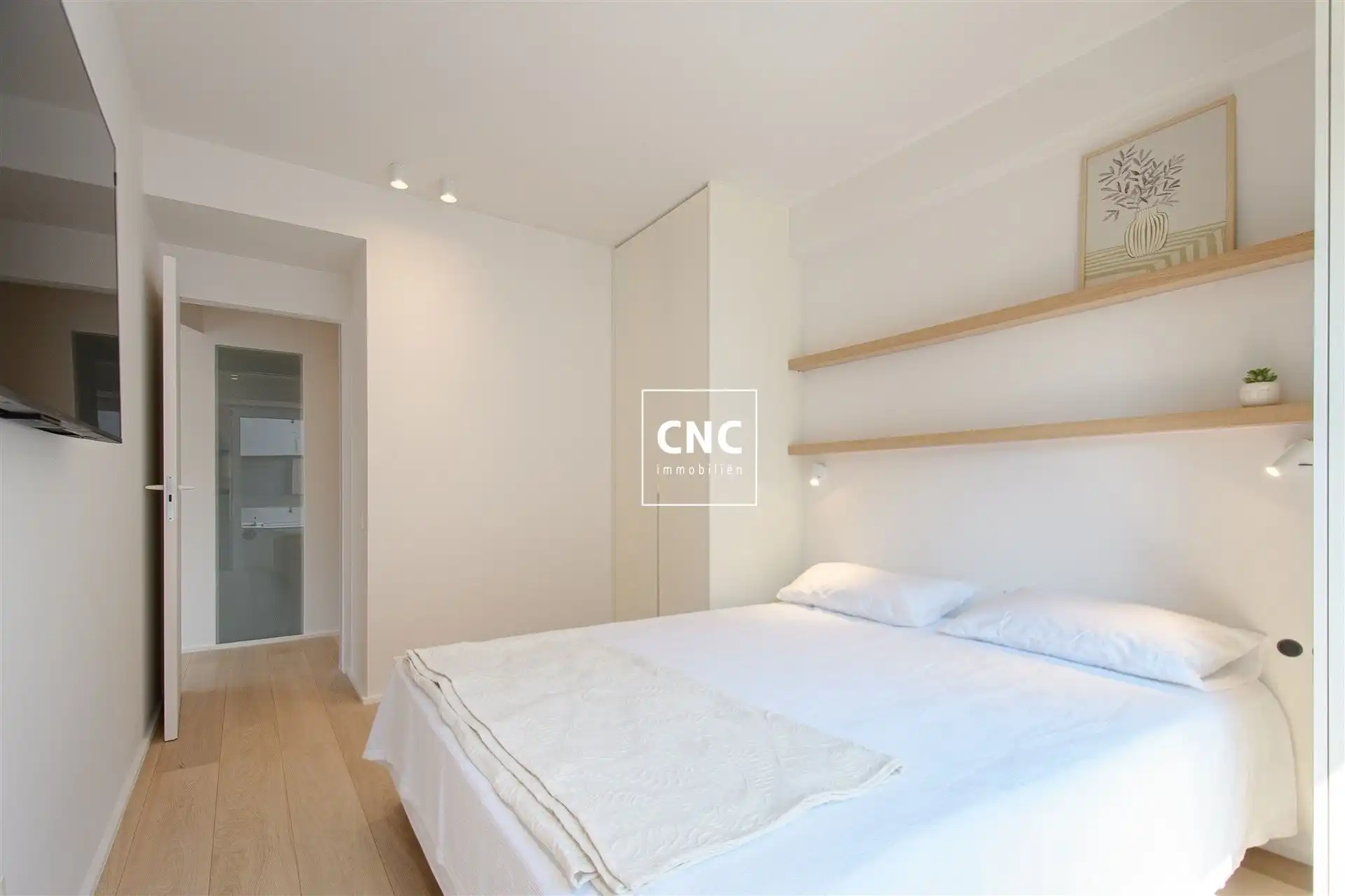 Stijlvol gerenoveerd en zonnig hoekappartement op topligging foto 11