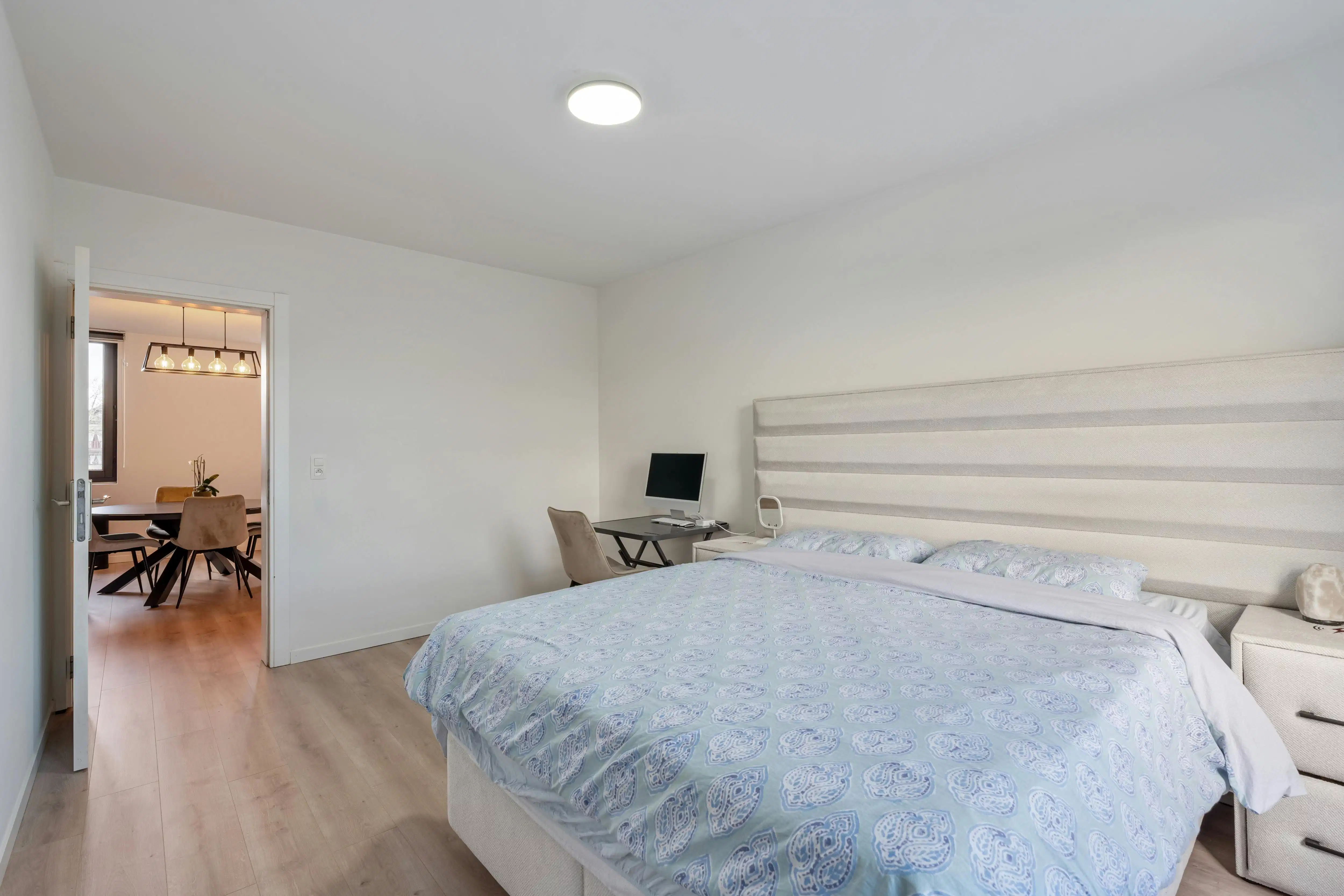 Rendabele opbrengsteigendom met handelspand, magazijn, woonst en 2 appartementen in Genk foto 6