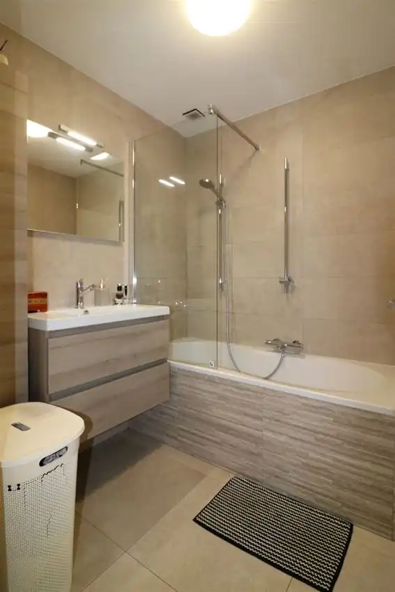 Gelijkvloers appartement met zuidgericht terras en tuintje, autostaanplaats foto 15