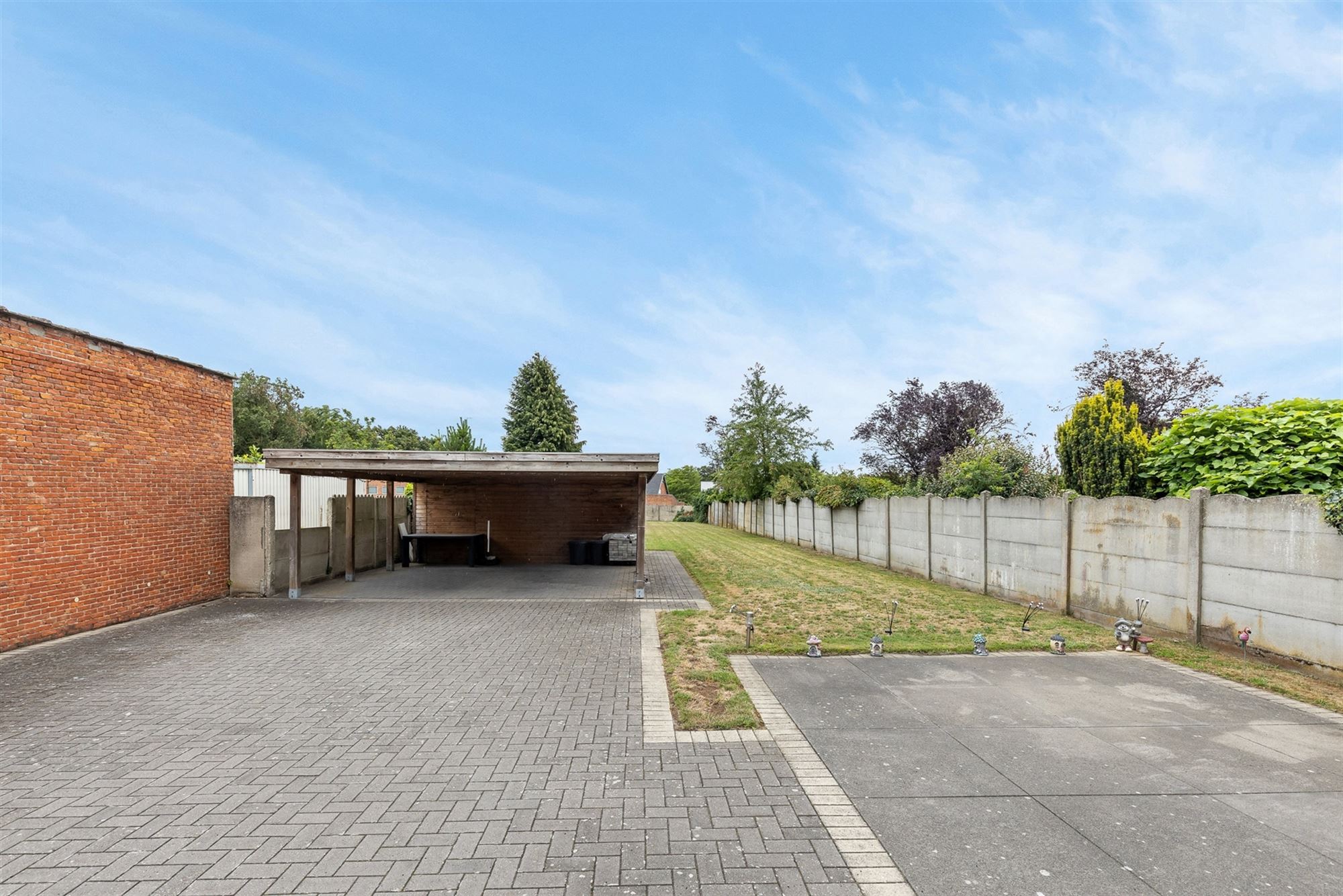 PERFECT ONDERHOUDEN GELIJKVLOERS APPARTEMENT MET 2 SLAAPKAMERS EN RUIME TUIN MET CARPORT EN BERGING TE HEUSDEN foto 24