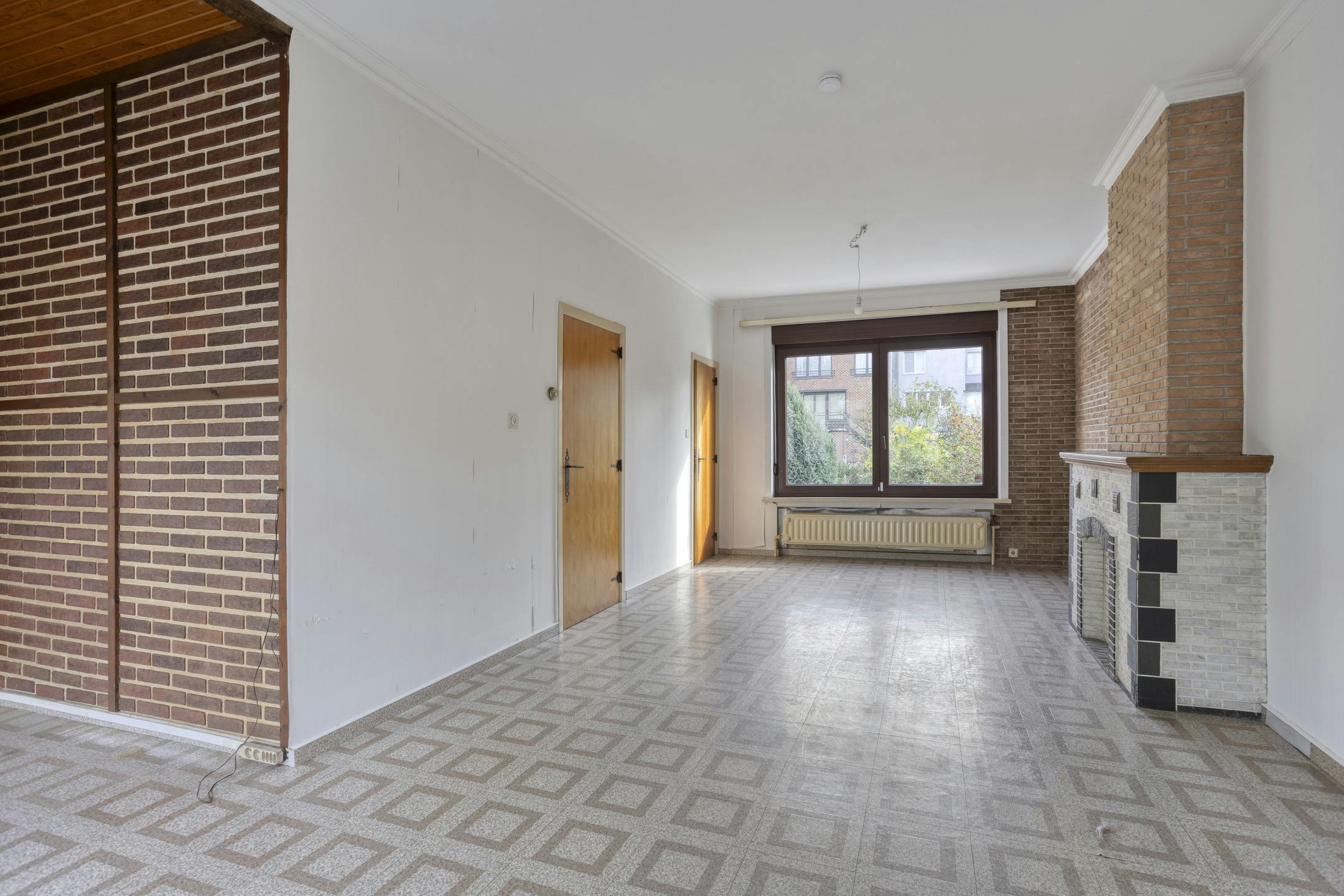 Te renoveren woning met potentieel in Sint-Agatha-Berchem! foto 4
