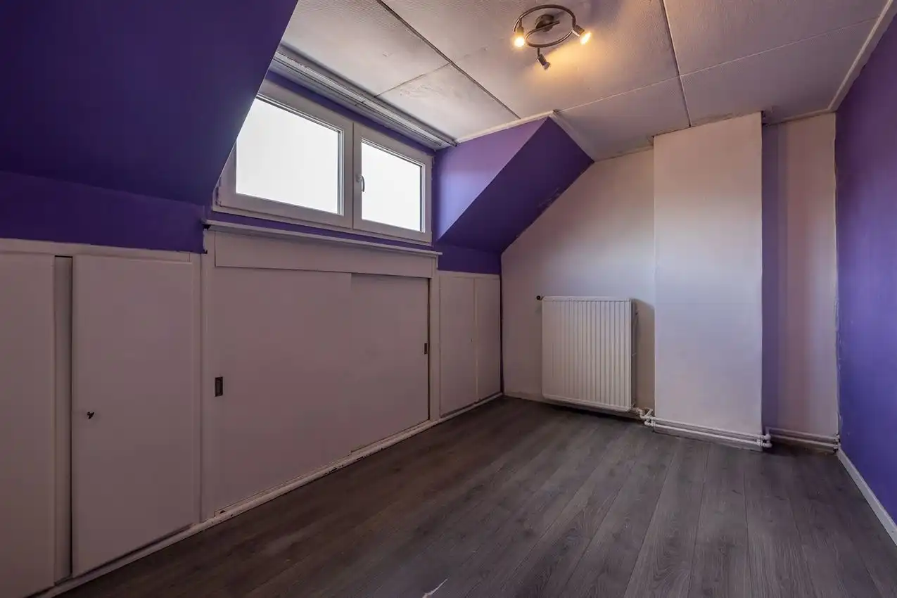 Ruime woning met zuidgerichte tuin en garage in rustige straat nabij centrum. EPC C en 5+ slaapkamers. foto 27