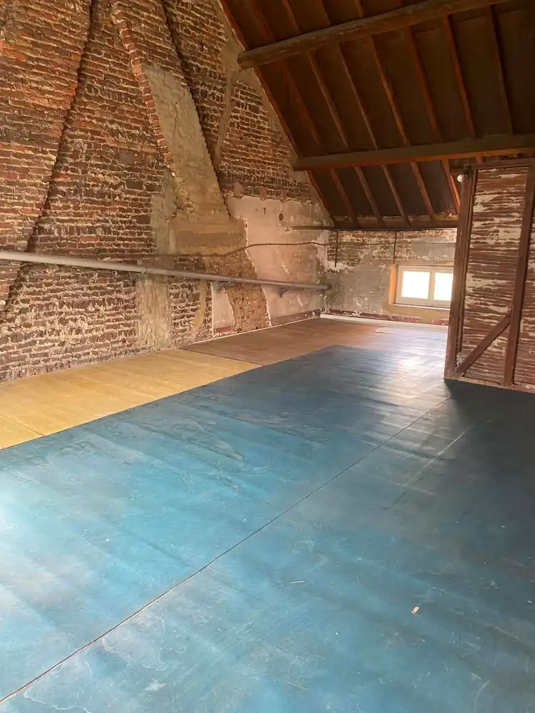 Centraal gelegen woning met tuin en ruime inrichtbare zolder foto 10