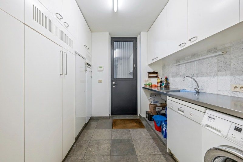 Instapklare architecturale woning met prachtige tuin en uitstekende ligging foto 14