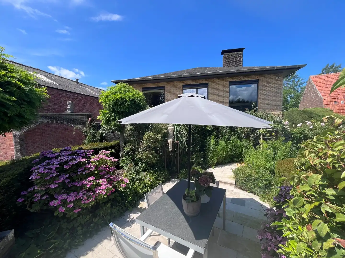 Ruime en zongerichte woning te koop te Wulpen. foto 17