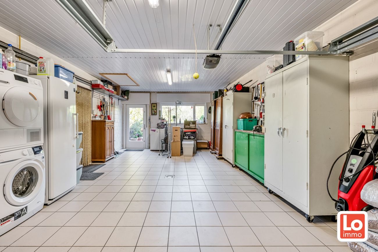 Charmante halfopen woning met inpandige garage op een rustige en groene locatie in Beervelde! foto 21