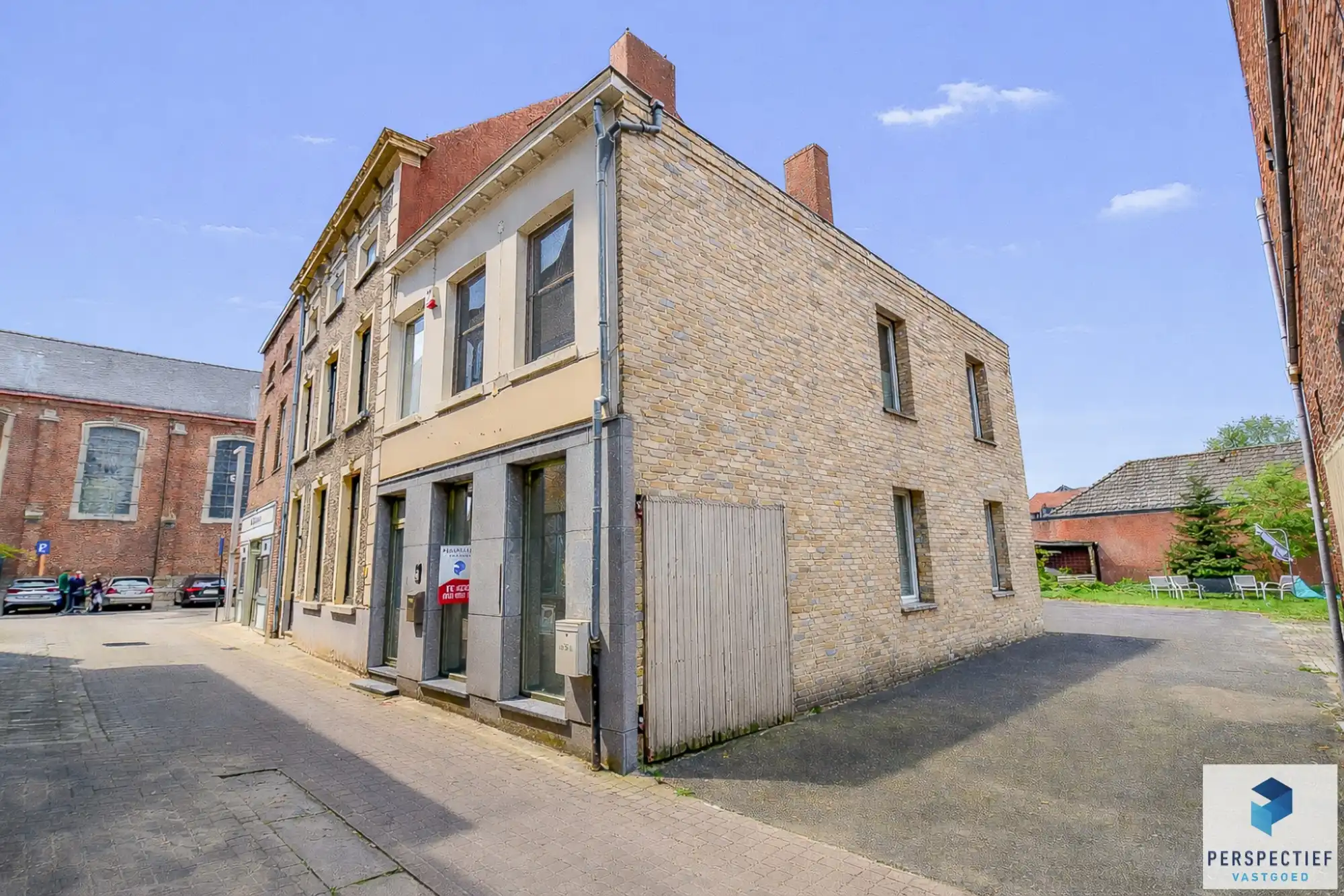 Handelsgelijkvloers en appartement  in centrum Oedelem foto 3