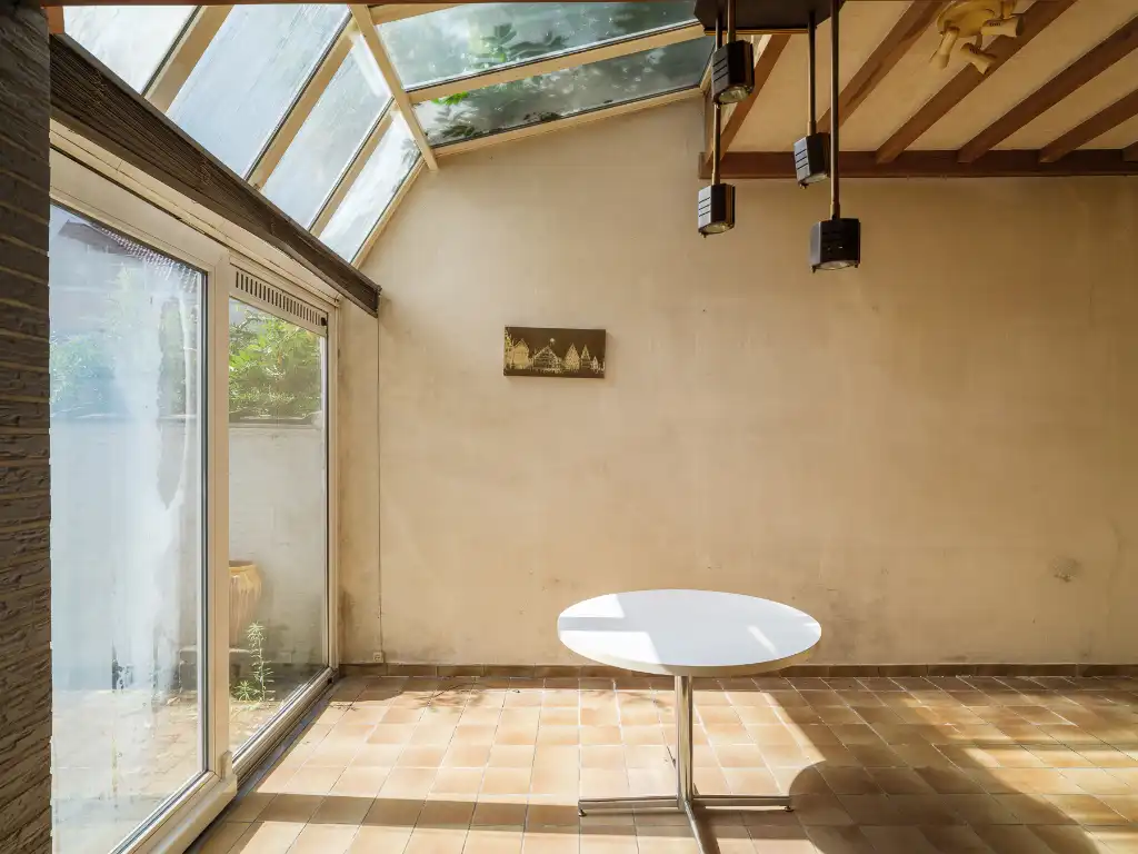 Karaktervolle interbellumwoning met uitzonderlijke stadstuin nabij de Coupure foto 9