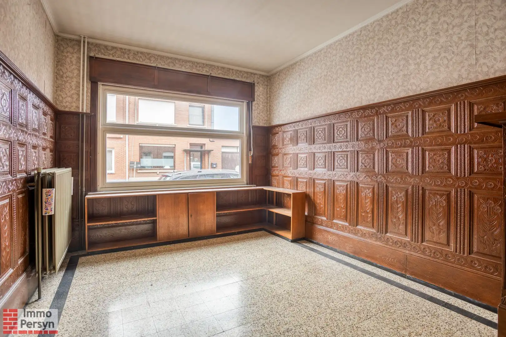 Te renoveren woning met 3 (mogelijks 4) slaapkamers en tuin met uitweg foto 3